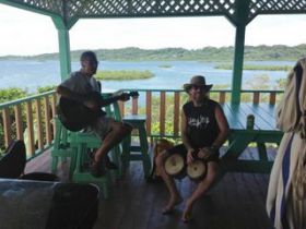expats playing instruments at Los Secretos, Bocas Del Toro, Panama – Best Places In The World To Retire – International Living